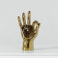gold hand figurine